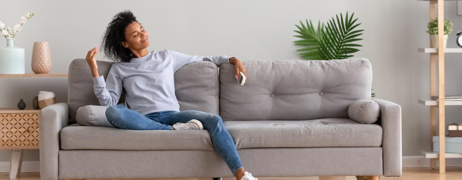 a person sitting on a couch